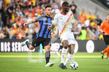 2022-07-23 - Lautaro MARTINEZ of Inter Milan and Kevin DANSO of Lens during the Pre Season Friendly football match between RC Lens and FC Internazionale Milano (Inter Milan) on July 23, 2022 at Bollaert-Delelis stadium in Lens, France - FOOTBALL - FRIENDLY GAME - LENS V FC INTER - INTERNAZIONALE - FRIENDLY MATCH - SOCCER