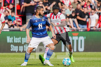 2022-07-23 - Nabil Fekir of Real Betis, Noni Madueke of PSV during the pre-season friendly football match between PSV and Real Betis on July 23, 2022 at Philips Stadion in Eindhoven, Netherlands - FOOTBALL - FRIENDLY GAME - PSV V REAL BETIS - FRIENDLY MATCH - SOCCER