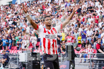 2022-07-23 - Cody Gakpo of PSV celebrates after scoring during the pre-season friendly football match between PSV and Real Betis on July 23, 2022 at Philips Stadion in Eindhoven, Netherlands - FOOTBALL - FRIENDLY GAME - PSV V REAL BETIS - FRIENDLY MATCH - SOCCER