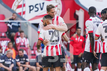 2022-07-23 - Phillipp Mwene of PSV celebrates the goal with Luuk de Jong during the pre-season friendly football match between PSV and Real Betis on July 23, 2022 at Philips Stadion in Eindhoven, Netherlands - FOOTBALL - FRIENDLY GAME - PSV V REAL BETIS - FRIENDLY MATCH - SOCCER