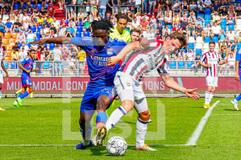 2022-07-23 - Irvyn Lomami of Olympique Lyonnais, Max Svensson of Willem II during the pre-season friendly football match between Willem II and Olympique Lyonnais on July 23, 2022 at Koning Willem II stadion in Tilburg, Netherlands - FOOTBALL - FRIENDLY GAME - WILLEM II V LYON - FRIENDLY MATCH - SOCCER