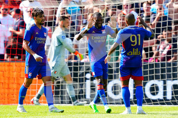 2022-07-24 - Alexandre Lacazette of Olympique Lyonnais celebrating his goal 0-1 with Lucas Paqueta and Jeff-Reine Adelaide during the Pre-season friendly match between Feyenoord and Olympique Lyon at Stadion Feyenoord on July 24, 2022 in Rotterdam, Netherlands - FOOTBALL - FRIENDLY GAME - FEYENOORD V LYON - FRIENDLY MATCH - SOCCER