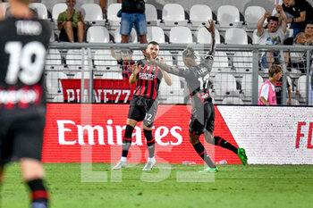 2022-08-06 - Milan's Ante Rebic celebrates after scoring a goal with Milan's Rafael Leao - LR VICENZA VS AC MILAN - FRIENDLY MATCH - SOCCER