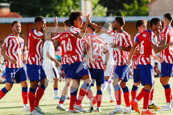 2022-07-27 - Atletico de Madrid players celebrate after the Mateus Cunha's goal during the pre season friendly football match between Numancia and Atletico de Madrid on July 27, 2022 at Sporting Uxama stadium in El Burgo de Osma, Soria, Spain - FOOTBALL - FRIENDLY GAME - NUMANCIA V ATLETICO MADRID - FRIENDLY MATCH - SOCCER