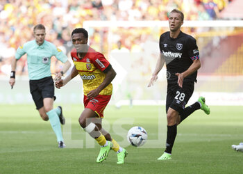 2022-07-30 - Lois Openda of Lens, Tomas Soucek of West Ham during the pre-season friendly football match between RC Lens (RCL) and West Ham United FC on July 30, 2022 at Stade Bollaert-Delelis in Lens, France - FOOTBALL - FRIENDLY GAME - LENS V WEST HAM - FRIENDLY MATCH - SOCCER