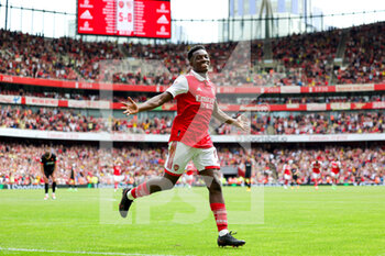 2022-07-30 - Eddie Nketiah (14) of Arsenal scores a goal and celebrates 6-0 during the Emirates Cup, friendly football match between Arsenal and Sevilla on July 30, 2022 at the Emirates Stadium in London, England - FOOTBALL - FRIENDLY GAME - ARSENAL V SEVILLA - FRIENDLY MATCH - SOCCER
