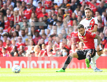 2022-08-01 - Manchester United defender Alex Telles (27) and Rayo Vallecano midfielder Unai Lopez (17) during the Pre-Season Friendly football match between Manchester United and Rayo Vallecano on July 31, 2022 at Old Trafford in Manchester, England - FOOTBALL - FRIENDLY GAME - MANCHESTER UNITED V RAYO VALLECANO - FRIENDLY MATCH - SOCCER