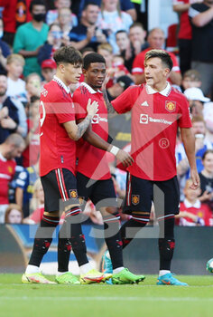 2022-08-01 - Manchester United midfielder Amad Diallo (16) is congratulated by team mates after his goal 1-0 during the Pre-Season Friendly football match between Manchester United and Rayo Vallecano on July 31, 2022 at Old Trafford in Manchester, England - FOOTBALL - FRIENDLY GAME - MANCHESTER UNITED V RAYO VALLECANO - FRIENDLY MATCH - SOCCER