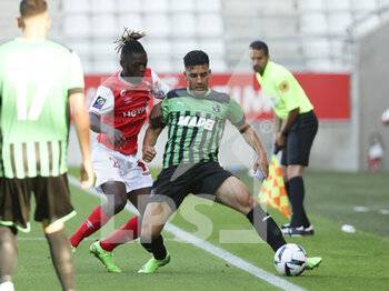2022-07-31 - Abdou Harroui of Sassuolo, Bradley Locko of Reims (left) during the pre-season friendly football match between Stade de Reims and US Sassuolo Calcio on July 31, 2022 at Stade Auguste Delaune in Reims, France - FOOTBALL - FRIENDLY GAME - REIMS V SASSUOLO - FRIENDLY MATCH - SOCCER