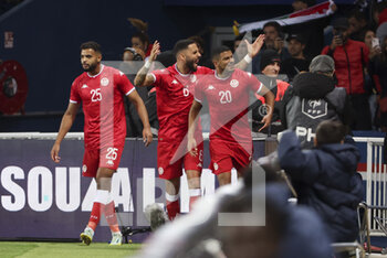 2022-09-27 - Anis Ben Slimane, Dylan Bronn, Mohamed Drager of Tunisia celebrate their goal during the International friendly game, football match between Brazil and Tunisia on September 27, 2022 at Parc des Princes stadium in Paris, France - FOOTBALL - FRIENDLY GAME - BRAZIL V TUNISIA - FRIENDLY MATCH - SOCCER