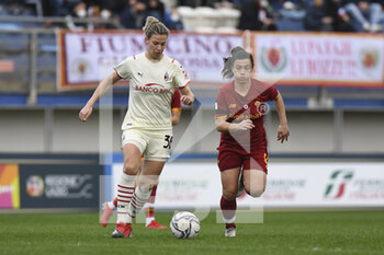 2022-01-05 - Valeria Pirone of AS Roma Women and Laura Sylvie Claudia Agard of A.C. Milan during the Women's Italian Supercup Semi-Final between A.S. Roma Women and A.C. Milan at the Domenico Francioni Stadium on 5th of January, 2022 in Latina, Italy. - AS ROMA VS AC MILAN - WOMEN SUPERCOPPA - SOCCER