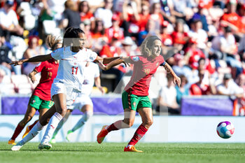 2022-07-09 - Portugal Midfielder Dolores Silva, Switzerland Midfielder Coumba Sow during the UEFA Women's Euro 2022, Group C football match between Portugal and Switzerland on July 9, 2022 at Leigh Sports Village in Leigh, England - FOOTBALL - WOMEN'S EURO 2022 - PORTUGAL V SWITZERLAND - UEFA EUROPEAN - SOCCER