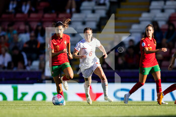 2022-07-09 - Portugal Forward Francisca Nazareth, Geraldine Reuteler of Switzerland during the UEFA Women's Euro 2022, Group C football match between Portugal and Switzerland on July 9, 2022 at Leigh Sports Village in Leigh, England - FOOTBALL - WOMEN'S EURO 2022 - PORTUGAL V SWITZERLAND - UEFA EUROPEAN - SOCCER