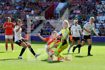 2022-07-11 - Jacqueline Burns (1) of Northern Ireland makes a save from Sarah Zadrazil (9) of Austria during the UEFA Women's Euro 2022, Group A football match between Austria and Northern Ireland on July 11, 2022 at the St Mary's Stadium in Southampton, England - FOOTBALL - WOMEN'S EURO 2022 - AUSTRIA V NORTHERN IRELAND - UEFA EUROPEAN - SOCCER