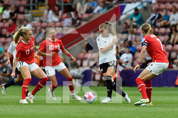 2022-07-11 - Emily Wilson (19) of Northern Ireland and Sarah Puntigam (17), Carina Wenninger (7) of Austria during the UEFA Women's Euro 2022, Group A football match between Austria and Northern Ireland on July 11, 2022 at the St Mary's Stadium in Southampton, England - FOOTBALL - WOMEN'S EURO 2022 - AUSTRIA V NORTHERN IRELAND - UEFA EUROPEAN - SOCCER