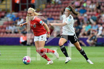 2022-07-11 - Sarah Puntigam (17) of Austria and Chloe McCarron (7) of Northern Ireland during the UEFA Women's Euro 2022, Group A football match between Austria and Northern Ireland on July 11, 2022 at the St Mary's Stadium in Southampton, England - FOOTBALL - WOMEN'S EURO 2022 - AUSTRIA V NORTHERN IRELAND - UEFA EUROPEAN - SOCCER