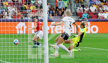 2022-07-12 - Lucia Garcia of Spain and goalkeeper Merle Frohms, Kathrin Hendrich of Germany during the UEFA Women's Euro 2022, Group B football match between Germany and Spain on July 12, 2022 at Brentford Community Stadium in Brentford, England - FOOTBALL - WOMEN'S EURO 2022 - GERMANY V SPAIN - UEFA EUROPEAN - SOCCER