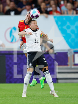 2022-07-12 - Alexandra Popp of Germany and Maria Pilar Leon of Spain during the UEFA Women's Euro 2022, Group B football match between Germany and Spain on July 12, 2022 at Brentford Community Stadium in Brentford, England - FOOTBALL - WOMEN'S EURO 2022 - GERMANY V SPAIN - UEFA EUROPEAN - SOCCER