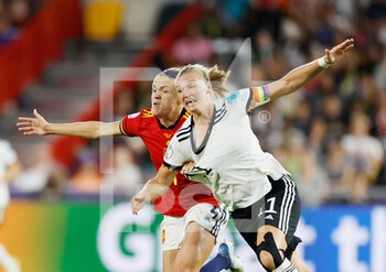 2022-07-12 - Irene Paredes of Spain and Alexandra Popp of Germany during the UEFA Women's Euro 2022, Group B football match between Germany and Spain on July 12, 2022 at Brentford Community Stadium in Brentford, England - FOOTBALL - WOMEN'S EURO 2022 - GERMANY V SPAIN - UEFA EUROPEAN - SOCCER