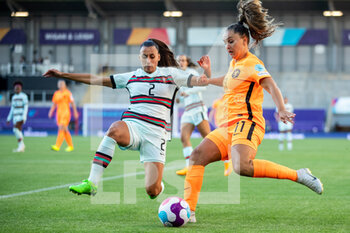 2022-07-13 - Lieke Martens of Netherlands (11) and Catarina Amado of Portugal during the UEFA Women's Euro 2022, Group C football match between Netherlands and Portugal on July 13, 2022 at Leigh Sports Village in Leigh, England - FOOTBALL - WOMEN'S EURO 2022 - NETHERLANDS V PORTUGAL - UEFA EUROPEAN - SOCCER
