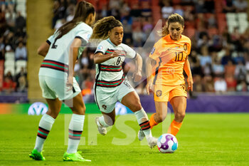 2022-07-13 - Portugal Forward Andreia Norton (8) and Danielle van de Donk of Netherlands (10) during the UEFA Women's Euro 2022, Group C football match between Netherlands and Portugal on July 13, 2022 at Leigh Sports Village in Leigh, England - FOOTBALL - WOMEN'S EURO 2022 - NETHERLANDS V PORTUGAL - UEFA EUROPEAN - SOCCER