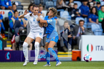 2022-07-14 - Iceland Defender Hallibera GIsiadottir (11) battles for possession with Italy Forward Valentina Giacinti (19) during the UEFA Women's Euro 2022, Group D football match between Italy and Iceland on July 14, 2022 at Manchester City Academy Stadium in Manchester, England - FOOTBALL - WOMEN'S EURO 2022 - ITALY V ICELAND - UEFA EUROPEAN - SOCCER