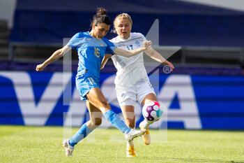 2022-07-14 - Italy Defender Lucia Di Guglielmo (16) and Agla Maria Albertsdottir of Iceland during the UEFA Women's Euro 2022, Group D football match between Italy and Iceland on July 14, 2022 at Manchester City Academy Stadium in Manchester, England - FOOTBALL - WOMEN'S EURO 2022 - ITALY V ICELAND - UEFA EUROPEAN - SOCCER