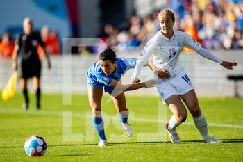 2022-07-14 - Italy Defender Lucia Di Guglielmo (16) and Iceland Midfielder Aslaug Munda Gunnlaugsdottir (19) battles for possession during the UEFA Women's Euro 2022, Group D football match between Italy and Iceland on July 14, 2022 at Manchester City Academy Stadium in Manchester, England - FOOTBALL - WOMEN'S EURO 2022 - ITALY V ICELAND - UEFA EUROPEAN - SOCCER