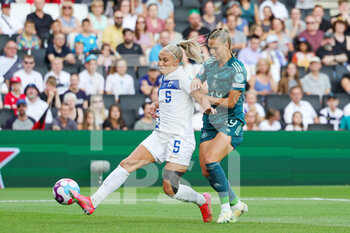 2022-07-16 - Emma Koivisto of Finland and Klara Buhl of Germany during the UEFA Women's Euro 2022, Group B football match between Finland and Germany on July 16, 2022 at Stadium MK in Milton Keynes, England - FOOTBALL - WOMEN'S EURO 2022 - FINLAND V GERMANY - UEFA EUROPEAN - SOCCER