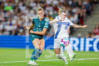 2022-07-16 - Laura Freigang of Germany and Natalia Kuikka of Finland during the UEFA Women's Euro 2022, Group B football match between Finland and Germany on July 16, 2022 at Stadium MK in Milton Keynes, England - FOOTBALL - WOMEN'S EURO 2022 - FINLAND V GERMANY - UEFA EUROPEAN - SOCCER