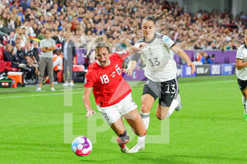 2022-07-21 - Julia Hickelsberger-Fuller of Austria is fouled by Sara Dabritz of Germany during the UEFA Women's Euro 2022, quarter final football match between Germany and Austria on July 21, 2022 at Brentford Community Stadium in Brentford, England - FOOTBALL - WOMEN'S EURO 2022 - 1/4 - GERMANY V AUSTRIA - UEFA EUROPEAN - SOCCER