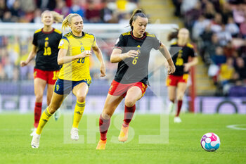 2022-07-22 - Tine De Caigny of Belgium and Fridolina Rolfo of Sweden during the UEFA Women's Euro 2022, quarter final football match between Sweden and Belgium on July 22, 2022 at Leigh Sports Village in Leigh, England - FOOTBALL - WOMEN'S EURO 2022 - 1/4 - SWEDEN V BELGIUM - UEFA EUROPEAN - SOCCER