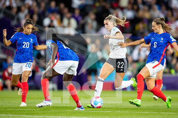 2022-07-27 - Jule Brand of Germany and Griedge Mbock, Sandie Toletti of France during the UEFA Women's Euro 2022, semi final football match between Germany and France on July 27, 2022 at stadium:mk in Milton Keynes, England - FOOTBALL - WOMEN'S EURO 2022 - 1/2 - GERMANY V FRANCE - UEFA EUROPEAN - SOCCER