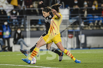 2022-03-22 - 20.03.2022, Madrid, Spain. Esther Gonzalez of Real Madrid CF Femenino (L) attempts a kick while being defended by Marta Torrejon Futbol Club Barcelona (R) during the UEFA Women's Champions League match between Real Madrid and FC Barcelona at Estadio Alfredo Di Stefano on 20 March 2022 in Madrid Spain. - REAL MADRID VS FC BARCELONA - UEFA CHAMPIONS LEAGUE WOMEN - SOCCER