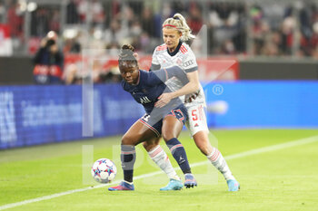 2022-03-22 - Sandy Baltimore of Paris Saint-Germain and Hanna Glas of Bayern Munich during the UEFA Women's Champions League, Quarter-finals, 1st leg football match between Bayern Munich and Paris Saint-Germain on March 22, 2022 at Allianz Arena in Munich, Germany - BAYERN MUNICH VS PARIS SAINT-GERMAIN - UEFA CHAMPIONS LEAGUE WOMEN - SOCCER