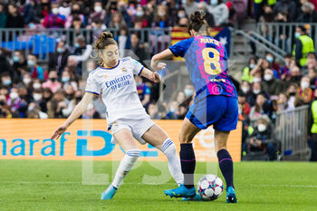 2022-03-30 - Marta Torrejon of FC Barcelona in action against Olga Carmona of Real Madrid during the UEFA Women's Champions League, Quarter-finals, 2nd leg football match between FC Barcelona and Real Madrid CF on March 30, 2022 at Camp Nou stadium in Barcelona, Spain - FC BARCELONA VS REAL MADRID CF - UEFA CHAMPIONS LEAGUE WOMEN - SOCCER