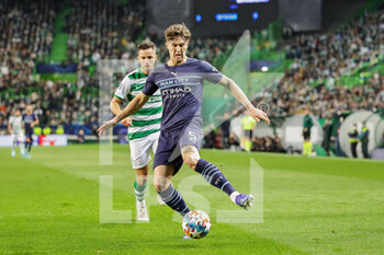 2022-02-15 - John Stones (5) of Manchester City during the UEFA Champions League, round of 16, 1st leg football match between Sporting Lisbon and Manchester City on February 15 2022 at Estadio Jose Alvalade in Lisbon, Portugal - SPORTING LISBON VS MANCHESTER CITY - UEFA CHAMPIONS LEAGUE - SOCCER