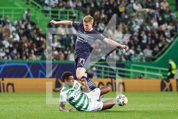 2022-02-15 - Matheus Reis (2) of Sporting CP slides in and tackles Kevin De Bruyne (17) of Manchester City during the UEFA Champions League, round of 16, 1st leg football match between Sporting Lisbon and Manchester City on February 15 2022 at Estadio Jose Alvalade in Lisbon, Portugal - SPORTING LISBON VS MANCHESTER CITY - UEFA CHAMPIONS LEAGUE - SOCCER