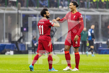 2022-02-16 - Liverpool forward Mohamed Salah (11) celebrates after his goal 0-2 with Liverpool defender Virgil van Dijk during the UEFA Champions League, Round of 16, 1st leg football match between FC Internazionale and Liverpool FC on February 16, 2022 at San Siro Stadium in Milan, Italy - INTER - FC INTERNAZIONALE VS LIVERPOOL FC - UEFA CHAMPIONS LEAGUE - SOCCER