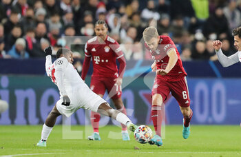 2022-02-16 - Joshua Kimmich of Bayern Munich and Mohamed Camara of RB Salzburg during the UEFA Champions League, Round of 16, 1st leg football match between RB Salzburg and Bayern Munich on February 16, 2022 at Red Bull Arena in Salzburg, Austria - RB SALZBURG VS BAYERN MUNICH - UEFA CHAMPIONS LEAGUE - SOCCER