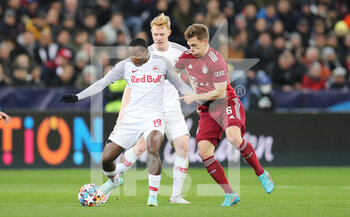 2022-02-16 - Mohamed Camara of RB Salzburg and Joshua Kimmich of Bayern Munich during the UEFA Champions League, Round of 16, 1st leg football match between RB Salzburg and Bayern Munich on February 16, 2022 at Red Bull Arena in Salzburg, Austria - RB SALZBURG VS BAYERN MUNICH - UEFA CHAMPIONS LEAGUE - SOCCER