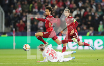 2022-02-16 - Leroy Sane of Bayern Munich and Max Wober of RB Salzburg during the UEFA Champions League, Round of 16, 1st leg football match between RB Salzburg and Bayern Munich on February 16, 2022 at Red Bull Arena in Salzburg, Austria - RB SALZBURG VS BAYERN MUNICH - UEFA CHAMPIONS LEAGUE - SOCCER