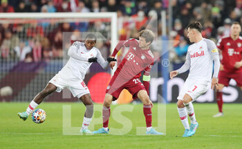 2022-02-16 - Mohamed Camara of RB Salzburg and Thomas Muller of Bayern Munich during the UEFA Champions League, Round of 16, 1st leg football match between RB Salzburg and Bayern Munich on February 16, 2022 at Red Bull Arena in Salzburg, Austria - RB SALZBURG VS BAYERN MUNICH - UEFA CHAMPIONS LEAGUE - SOCCER