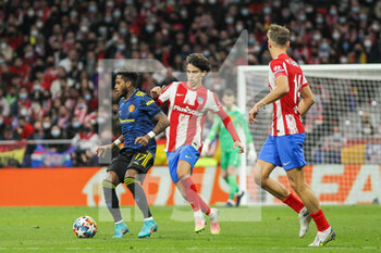 2022-02-23 - Fred of Manchester United and Joao Felix of Atletico de Madrid during the UEFA Champions League, round of 16, 1st leg football match between Atletico de Madrid and Manchester United on February 23, 2022 in Madrid, Spain - ATLETICO DE MADRID VS MANCHESTER UNITED - UEFA CHAMPIONS LEAGUE - SOCCER