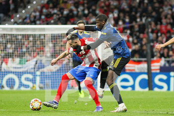 2022-02-23 - Hector Herrera of Atletico de Madrid and Paul Pogba of Manchester United during the UEFA Champions League, round of 16, 1st leg football match between Atletico de Madrid and Manchester United on February 23, 2022 in Madrid, Spain - ATLETICO DE MADRID VS MANCHESTER UNITED - UEFA CHAMPIONS LEAGUE - SOCCER