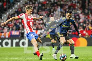 2022-02-23 - Cristiano Ronaldo of Manchester United and Marcos Llorente of Atletico de Madrid during the UEFA Champions League, round of 16, 1st leg football match between Atletico de Madrid and Manchester United on February 23, 2022 in Madrid, Spain - ATLETICO DE MADRID VS MANCHESTER UNITED - UEFA CHAMPIONS LEAGUE - SOCCER