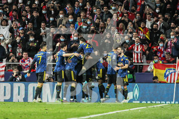 2022-02-23 - Anthony Elanga of Manchester United celebrates his goal 1-1 with teammates during the UEFA Champions League, round of 16, 1st leg football match between Atletico de Madrid and Manchester United on February 23, 2022 in Madrid, Spain - ATLETICO DE MADRID VS MANCHESTER UNITED - UEFA CHAMPIONS LEAGUE - SOCCER