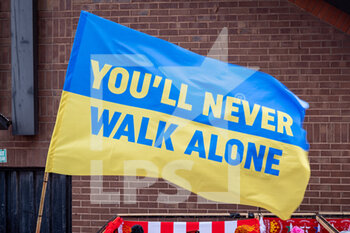 2022-03-08 - General stadium view outside Anfield, You'll Never Walk Alone flag in Ukrainian colours, before the UEFA Champions League, Round of 16, 2nd leg football match between Liverpool and FC Internazionale on March 8, 2022 at Anfield stadium in Liverpool, England - LIVERPOOL VS FC INTERNAZIONALE - UEFA CHAMPIONS LEAGUE - SOCCER