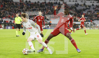 2022-03-08 - Brenden Aaronson of Salzburg and Dayot Upamecano of Red Bull Salzburg during the UEFA Champions League, Round of 16, 2nd leg football match between Bayern Munich and Red Bull Salzburg on March 8, 2022 at Allianz Arena in Munich, Germany - BAYERN MUNICH VS RED BULL SALZBURG - UEFA CHAMPIONS LEAGUE - SOCCER