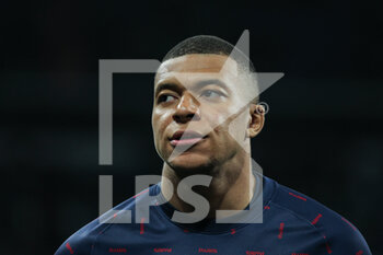 2022-03-09 - Kylian Mbappe of PSG warms up during the UEFA Champions League, Round of 16, 2nd leg football match between Real Madrid and Paris Saint-Germain on March 9, 2022 at Santiago Bernabeu stadium in Madrid, Spain - REAL MADRID VS PARIS SAINT-GERMAIN - UEFA CHAMPIONS LEAGUE - SOCCER